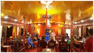  Listening to Hue folk songs on Dragon Boat Trip-Culture Pham Travel